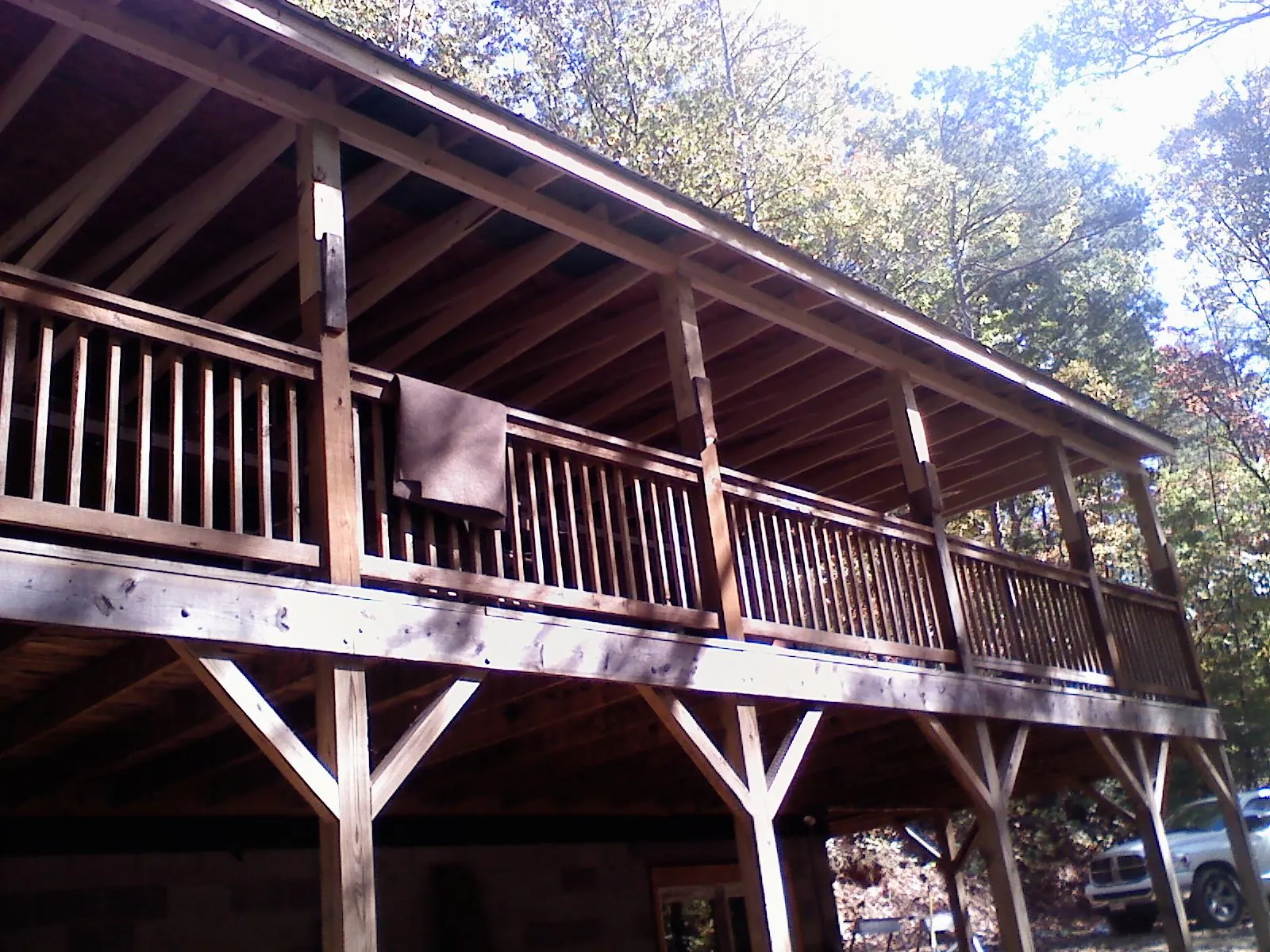 Timber framing under a new elevated porch and deck — Roof Leak Repair in Newalla by Roofing Brothers